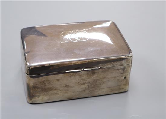 An Edwardian silver cigarette box by A & J Zimmerman, Birmingham, 1905,